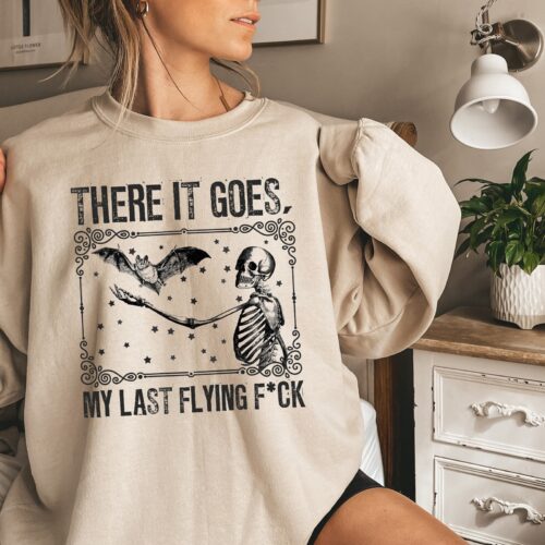 There It Goes My Last Flying F*ck: Sarcastic Skeleton Spooky Vibes Halloween Tee image 0