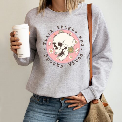 Thick Thighs & Spooky Vibes: Funny Halloween Party Sweatshirt image 0