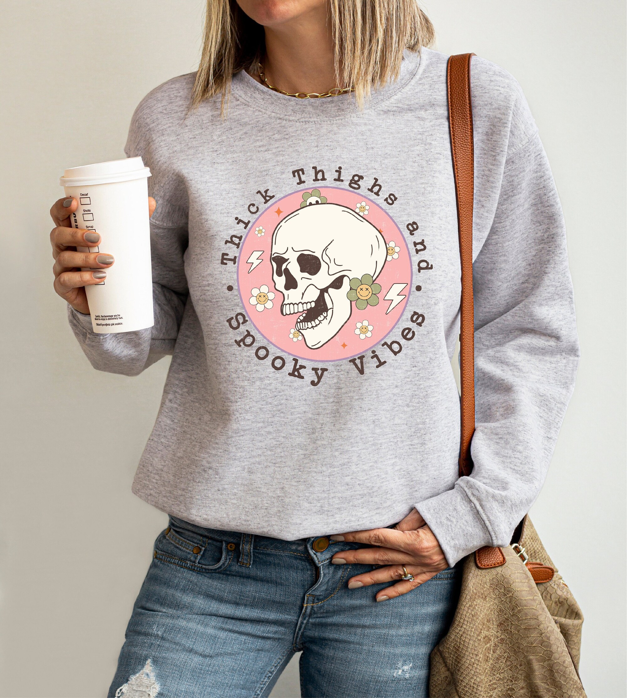 Thick Thighs & Spooky Vibes: Funny Halloween Party Sweatshirt image 0