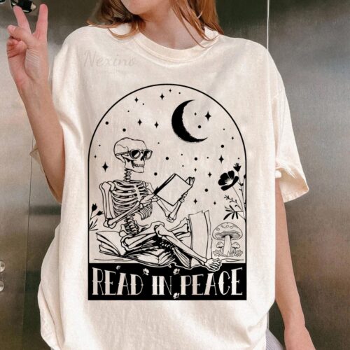 Read in Peace Shirt: Skeleton Reading Book Lover Halloween Tee image 0