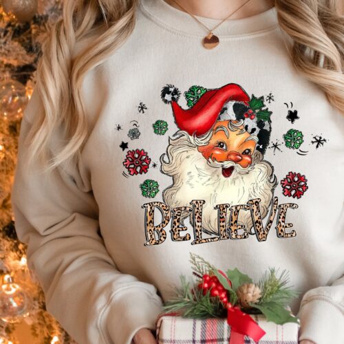 Believe Christmas Shirt: Family Party Tee Festive T-Shirt" image 0