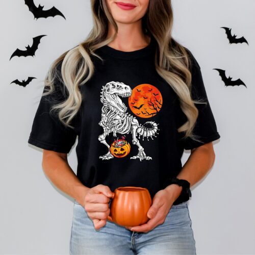 Halloween Trick Or Treat Dinosaur Shirt | Funny T-Rex Pumpkin Tee | Spooky Season Costume Gift image 0